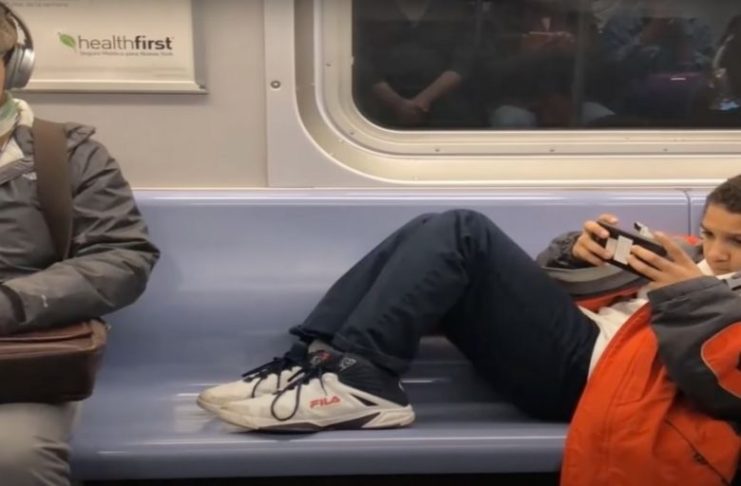 Stranger teaches teenager a lesson after he refuses to move his legs to the side in the metro